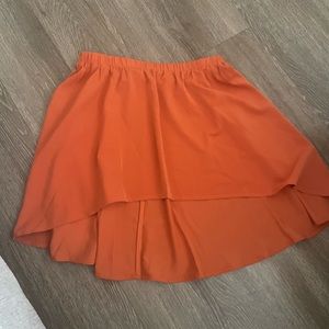 Sleeveless orange top